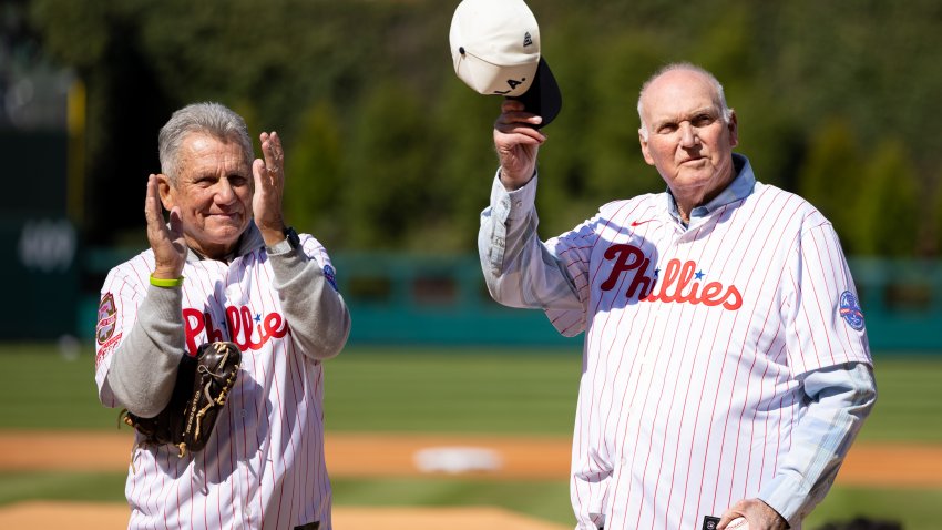 Mar 29, 2024; Philadelphia, Pennsylvania, USA; Philadelphia Phillies greats Larry Bowa (L) and Charlie Manuel (R) prepare to throw out a first pitch on opening day against the Atlanta Braves at Citizens Bank Park. Mandatory Credit: Bill Streicher-USA TODAY Sports